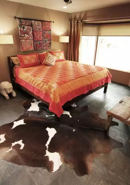 Exotic bedroom cowhide rug