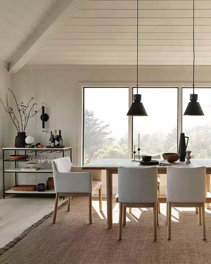 family table with white chairs