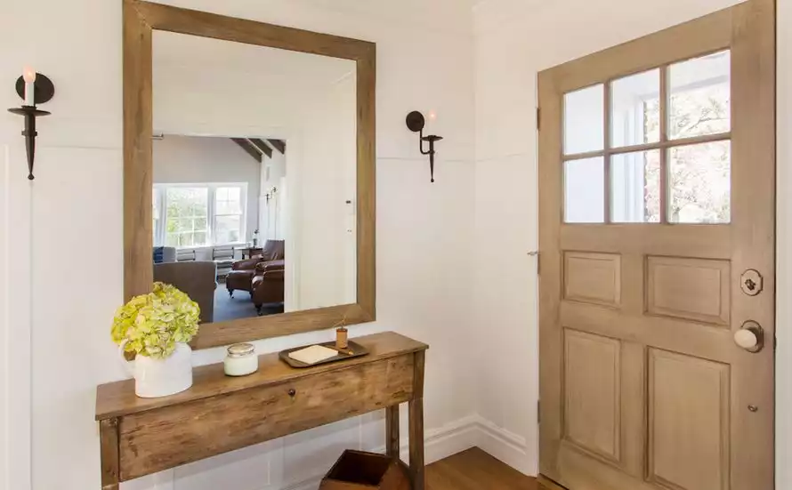 Foyer framed mirror