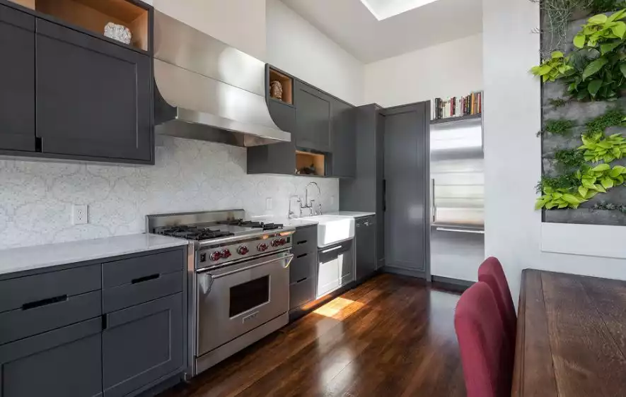 grey-kitchen-color-and-vertical-garden-with-mosaic-backsplash