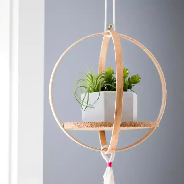 A bubble shelf made of repurposed embroidery hoops