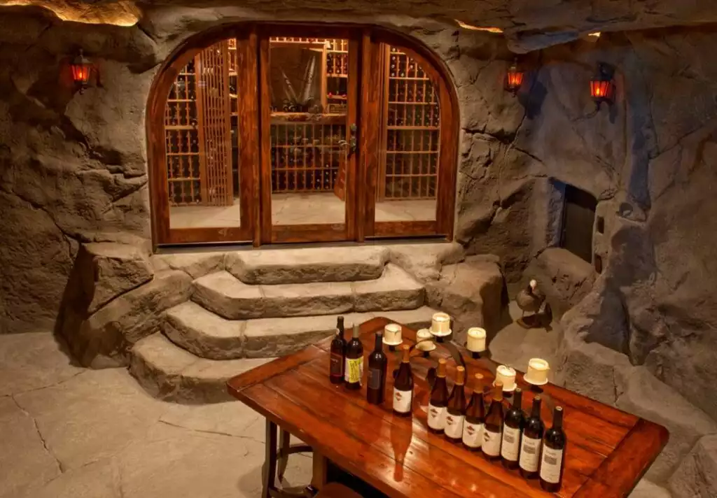 Man cave with real stone walls and wine 1024x712