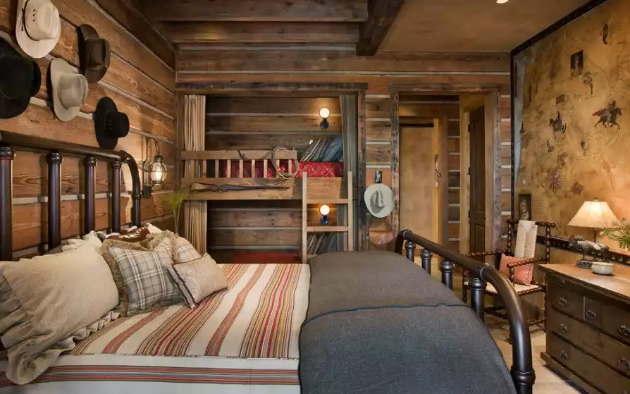 Rustic bedroom with normal bed and bunk beds