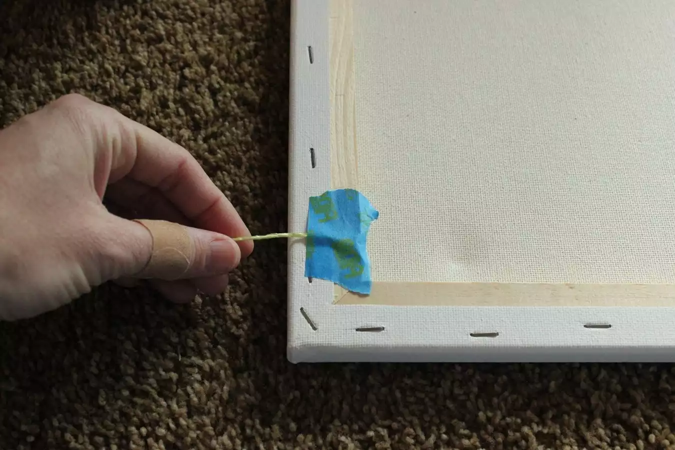 Tape down canvas wall art