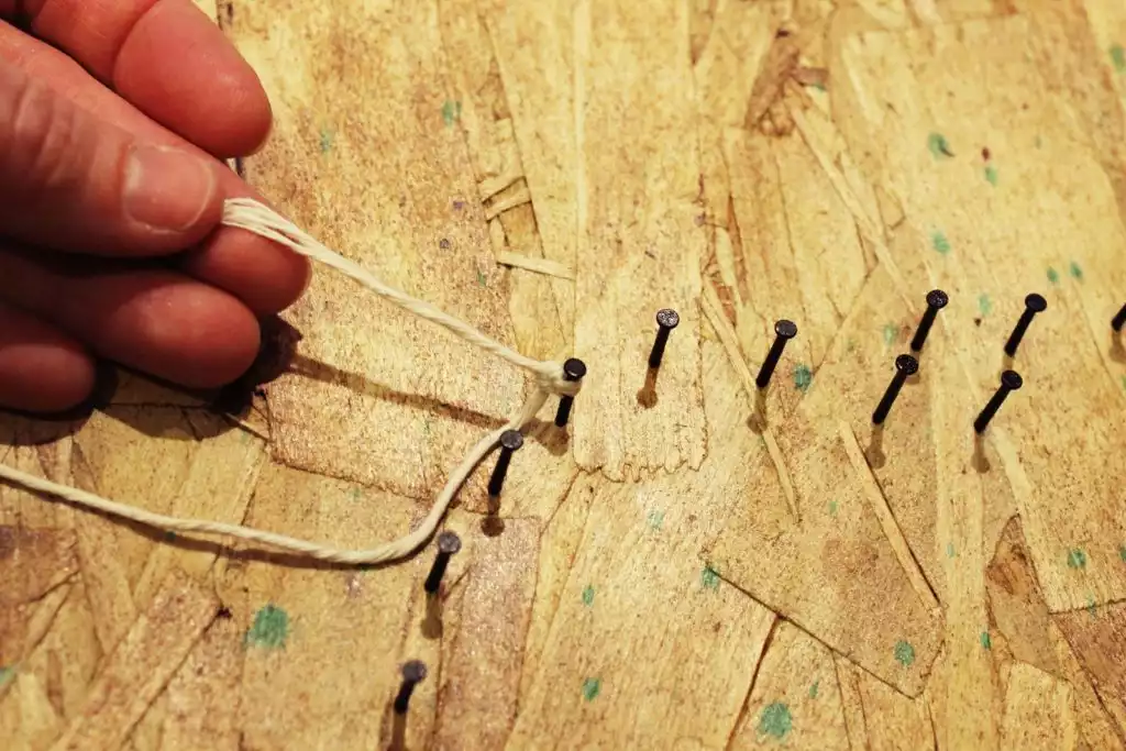 Tie string on nails 1024x683