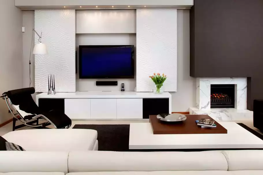 wall unit designed around the TV