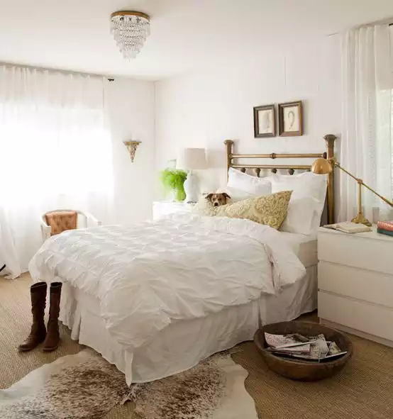 White bedroom cowhide rug