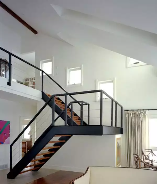 White walls black steel staircase