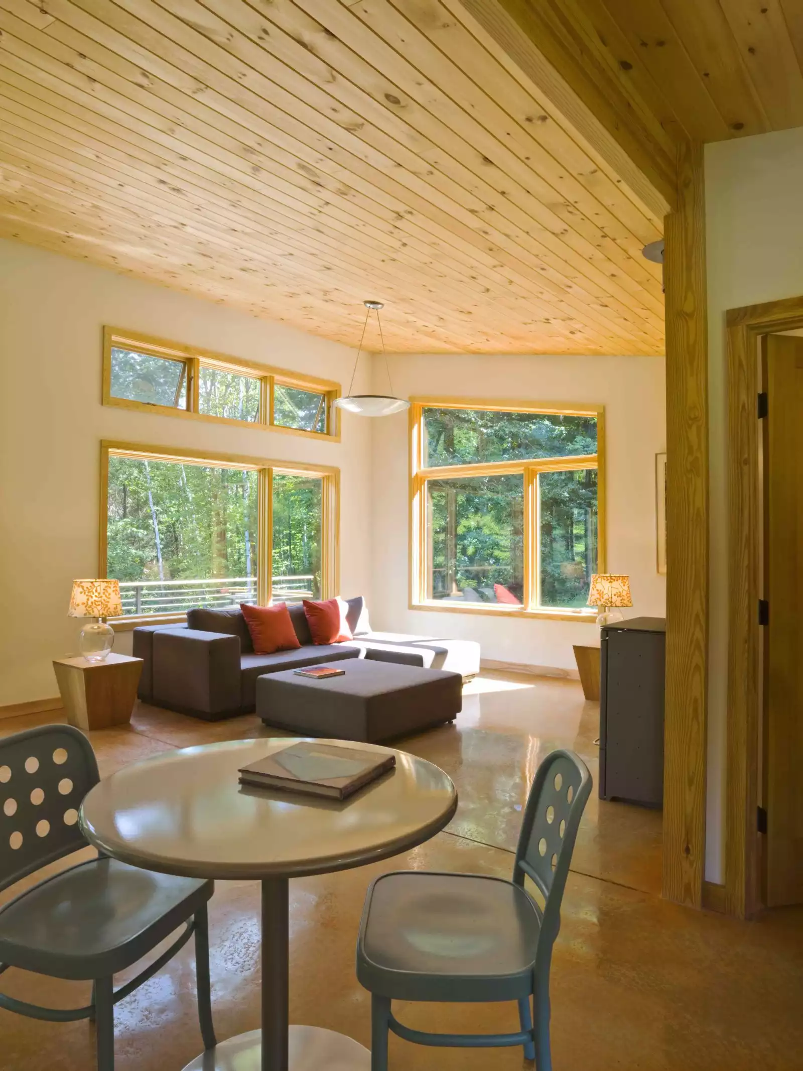 Wood cabin featuring polished concrete floor