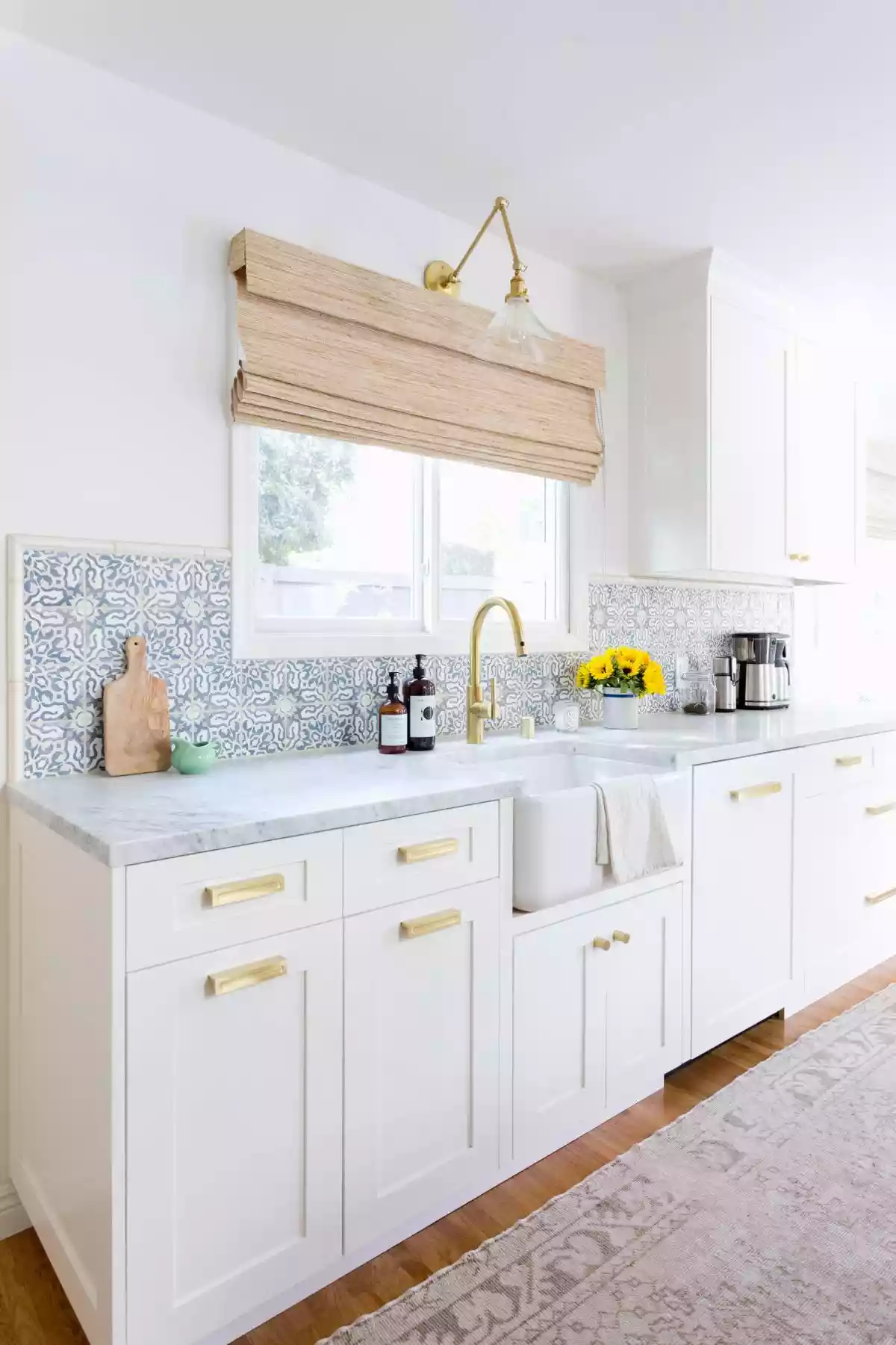 Carrara marble kitchen countertops and decorative backsplash
