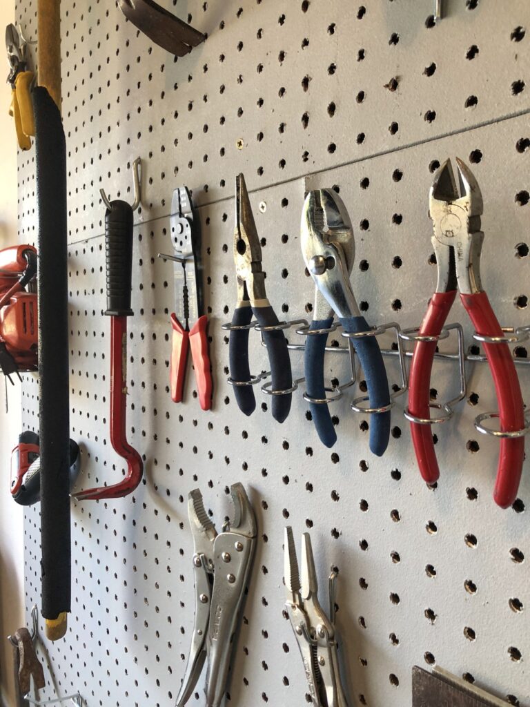 Garage tools storage on wall 768x1024